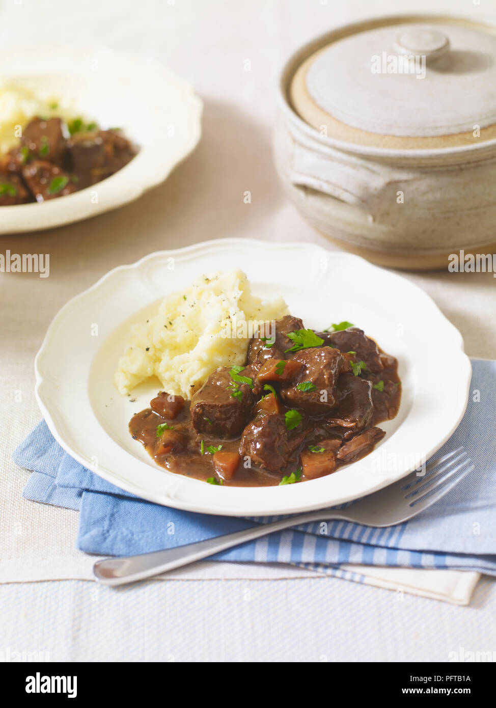 Beef in beer stew served with mash Stock Photo