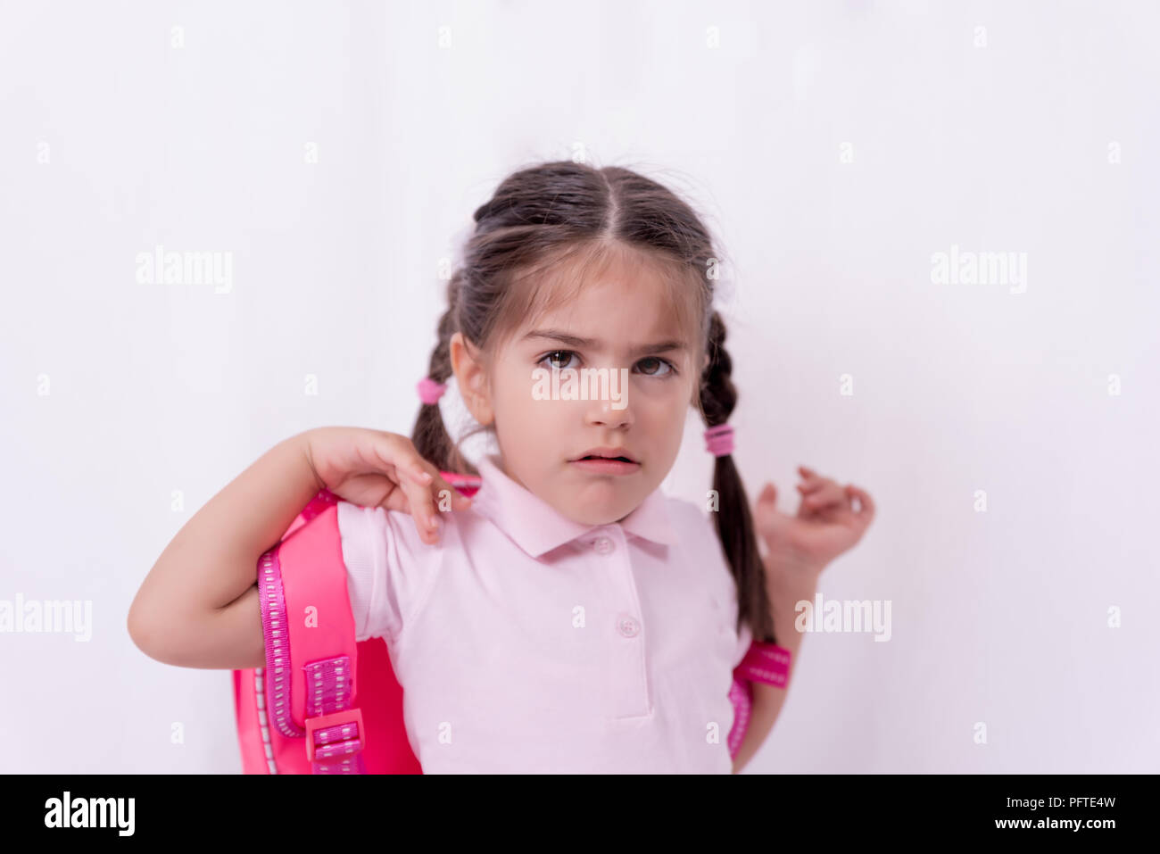 Girl child school uniform sad hi-res stock photography and images - Alamy