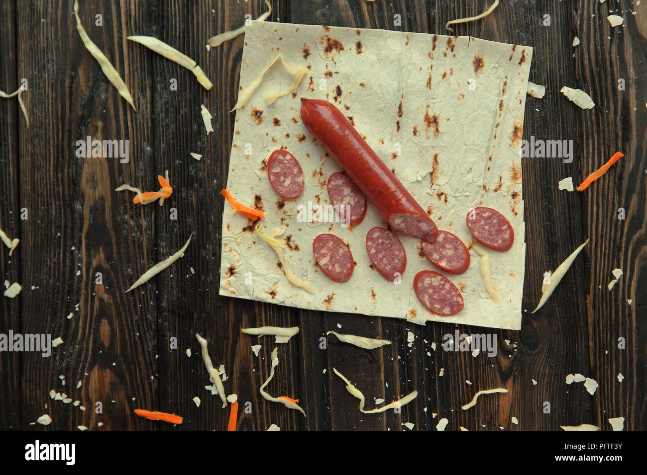 salami sliced on pita bread.preparation of Shawarma. photo with Stock
