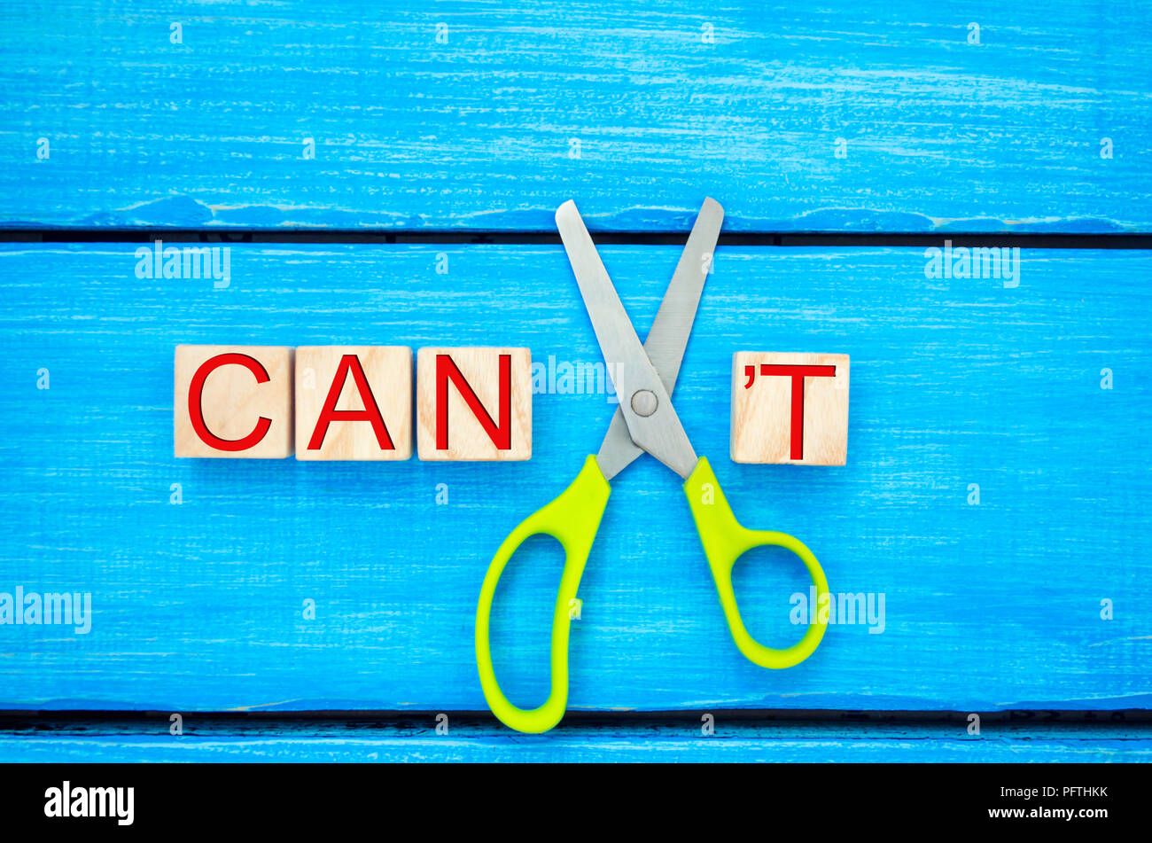 I can self motivation - cutting the letter t of the written word I can't so it says I can, goal achievement, potential, overcoming Stock Photo