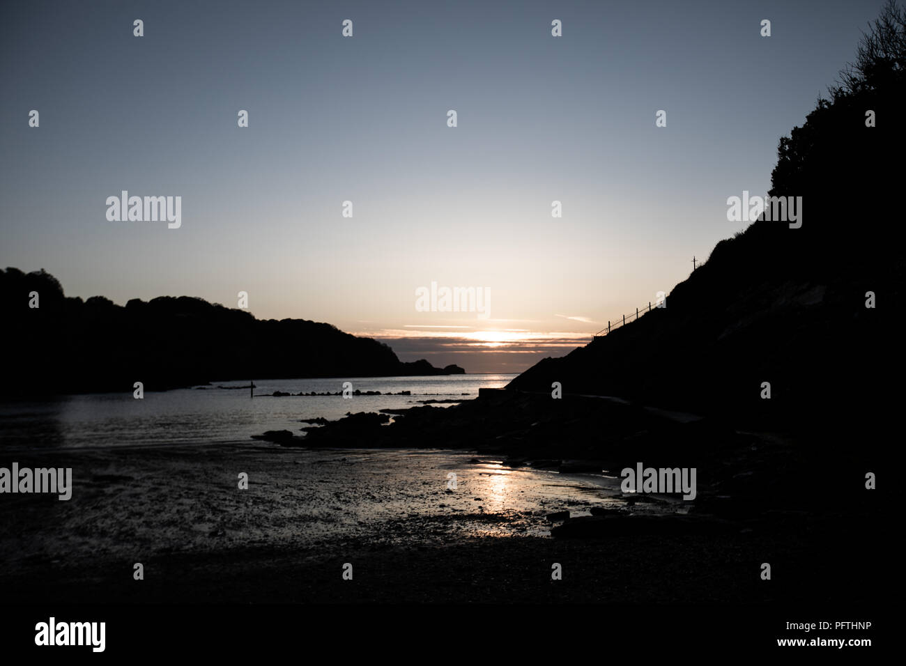Sunset Over Rocky Beach Coomb Martin, illfracoomb, Devon Stock Photo