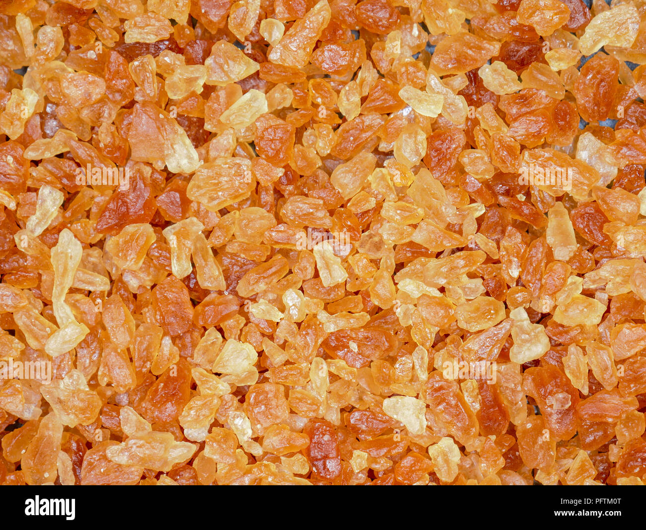 sweet brown rock sugar food texture background Stock Photo