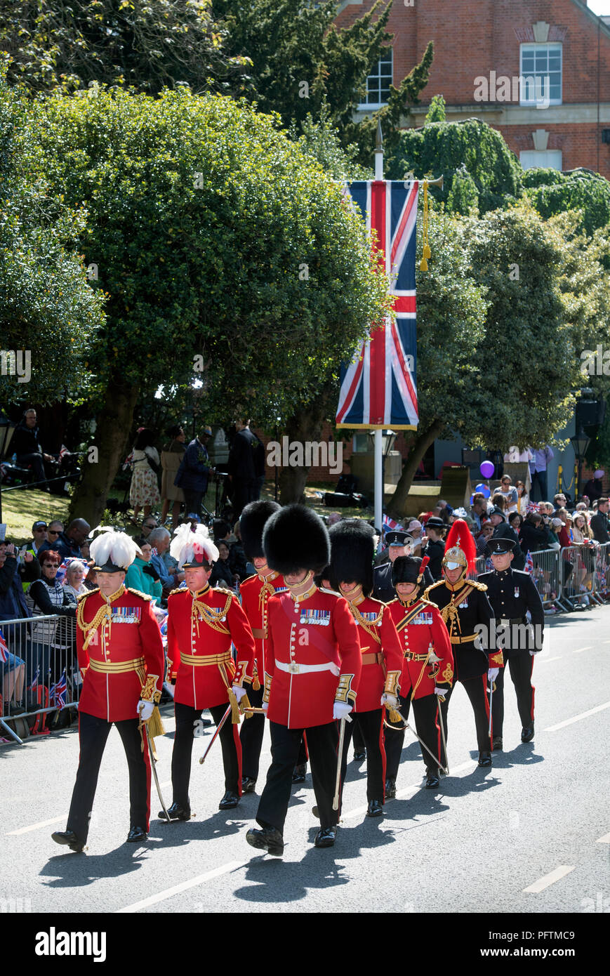 Representatives of divisions of Guards in Windsor on the day of the wedding of Prince Harry & Meghan Markle with royal fans lining the High Street Stock Photo