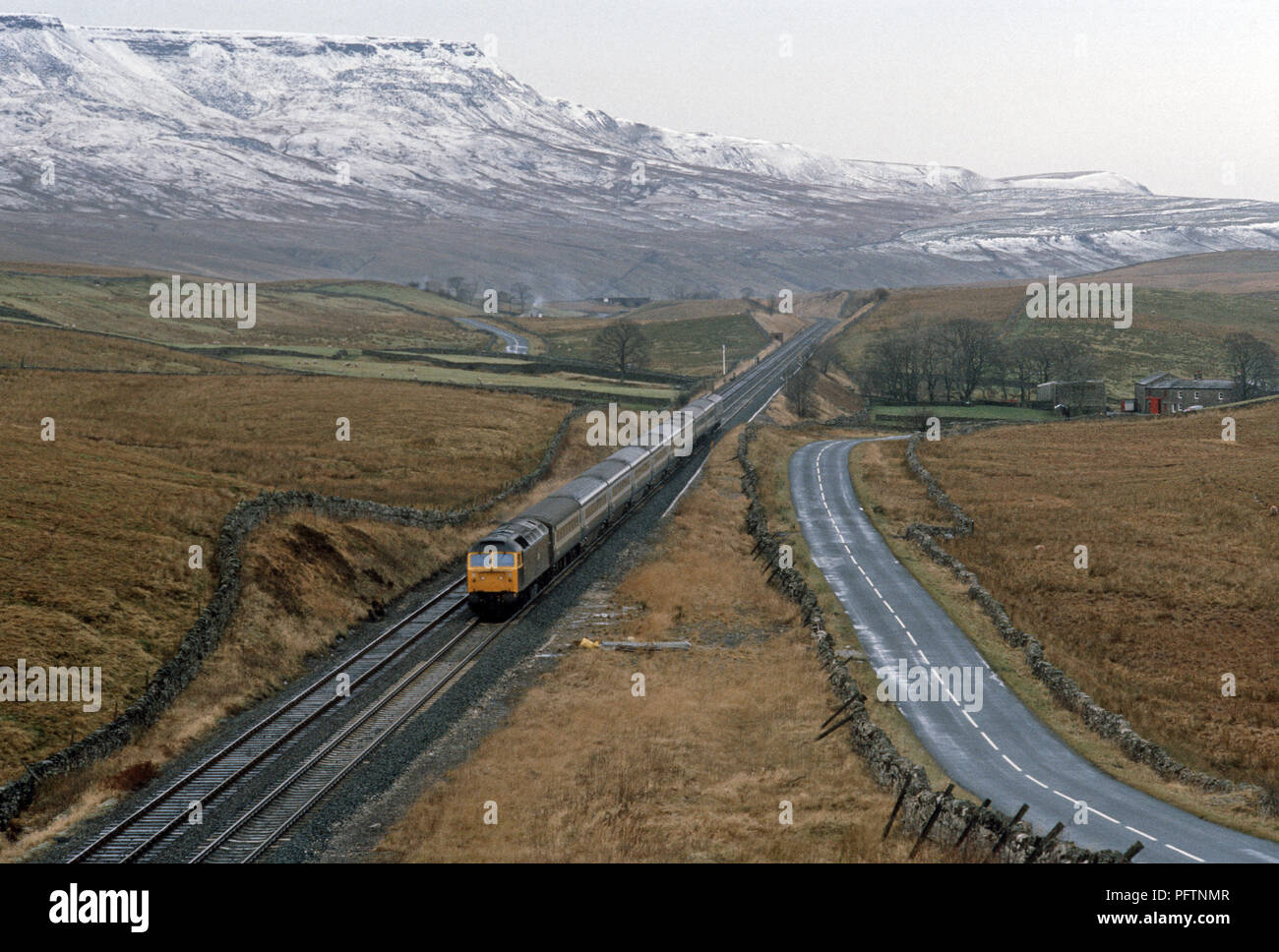 British Rail Settle to Carlisle Pennine passenger train at Ais Gill summit about to enter Blea Moor tunnel. Stock Photo