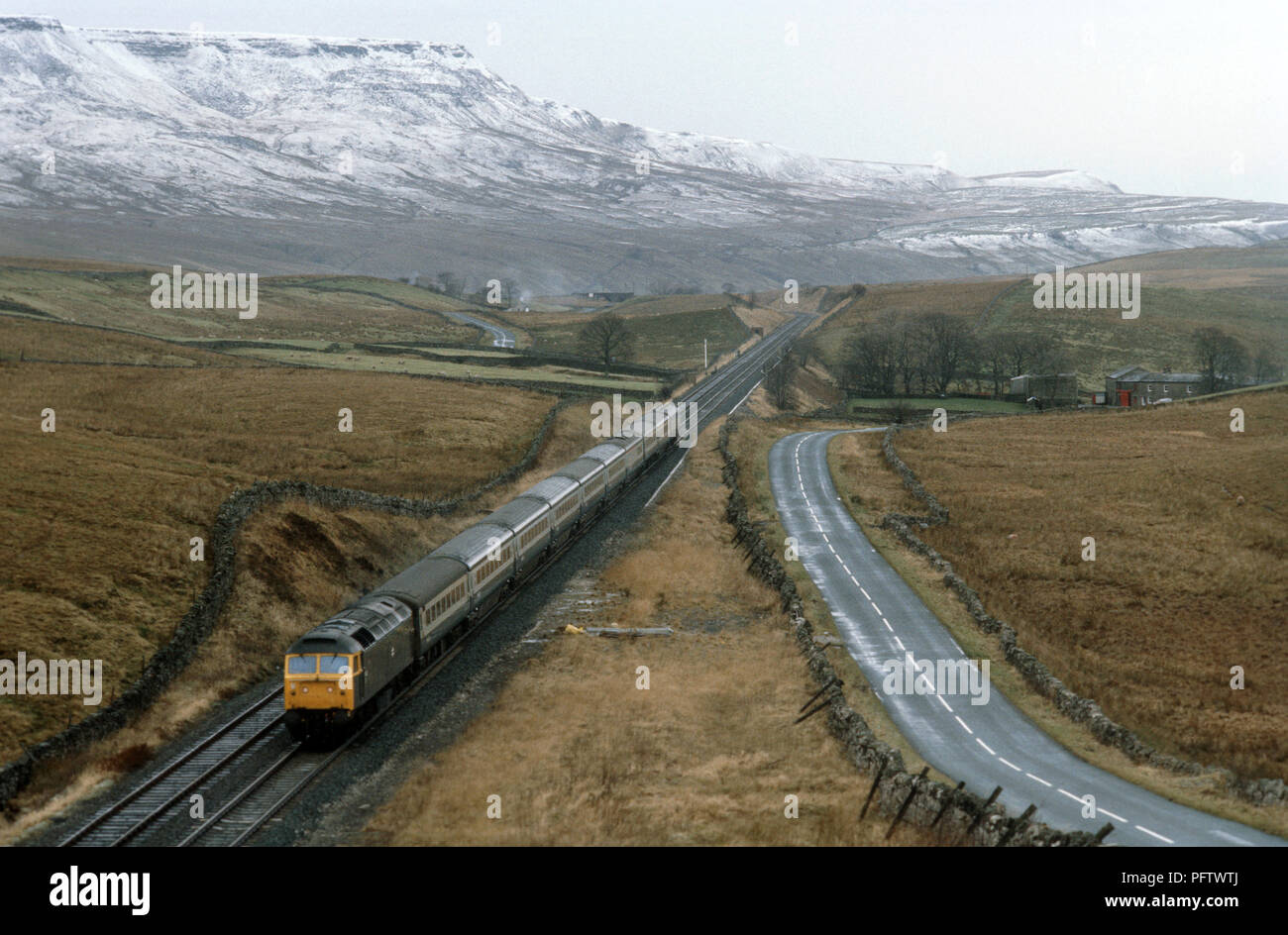 British Rail Settle to Carlisle Pennine passenger train at Ais Gill summit about to enter Blea Moor tunnel. Stock Photo