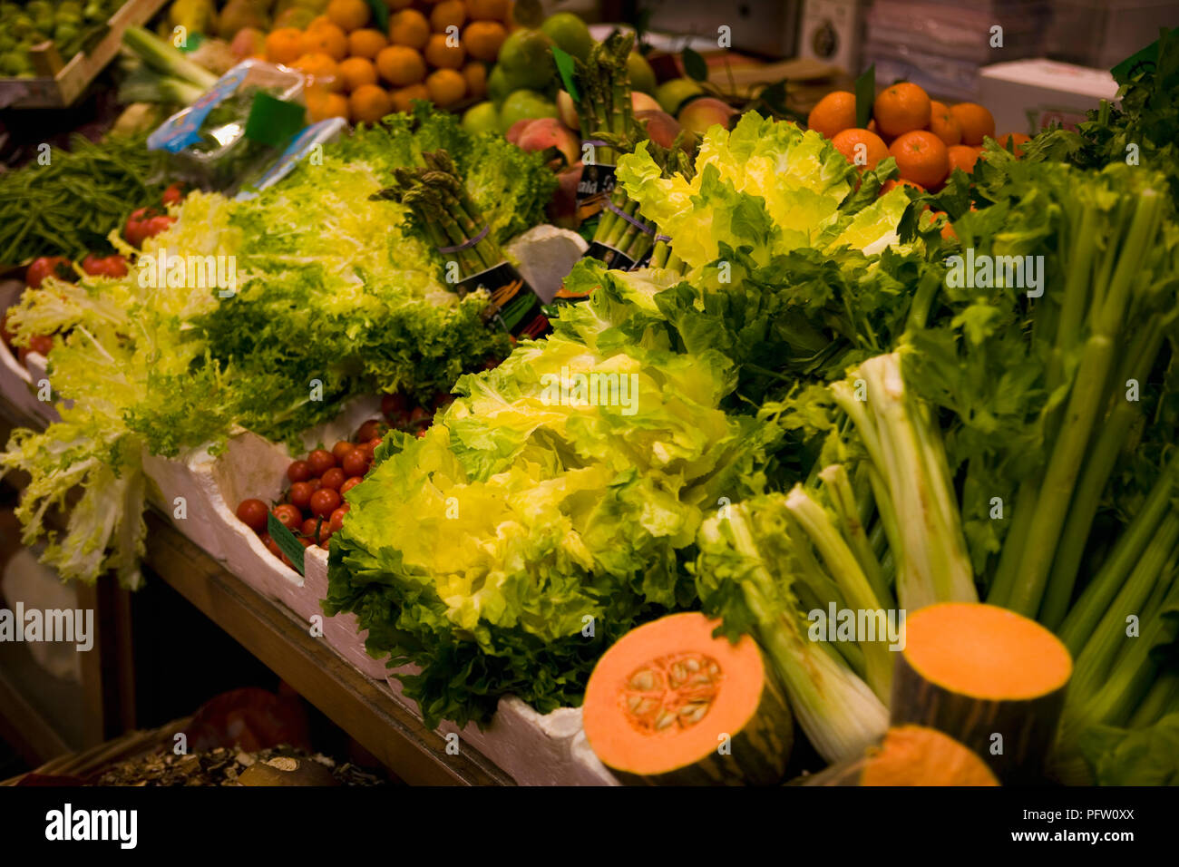 Colourful display of vegetables on a food stall in the Mercato Centrale, San Giovanni, Florence, Italy Stock Photo