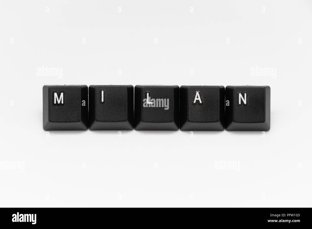 black keys of keyboard with different years words or names Stock Photo