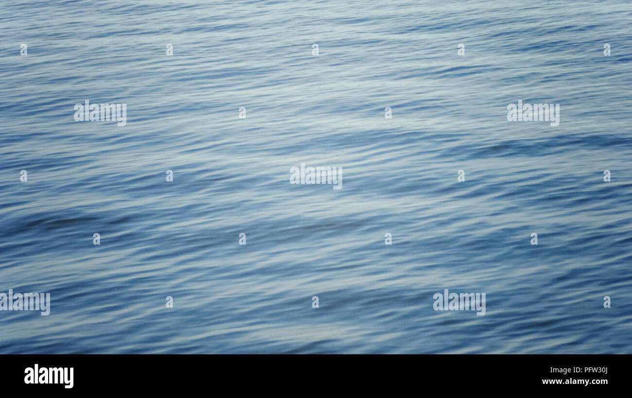 Background pure of aqua sea water surface with ripple Stock Photo - Alamy