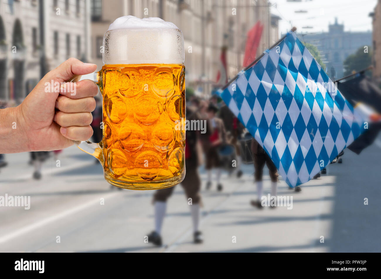 isolated beer mug in hand at Oktoberfest in Munich Stock Photo Alamy