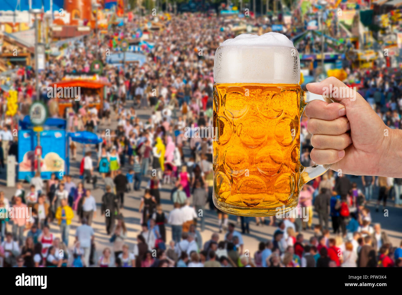 isolated beer mug in hand at Oktoberfest in Munich Stock Photo Alamy