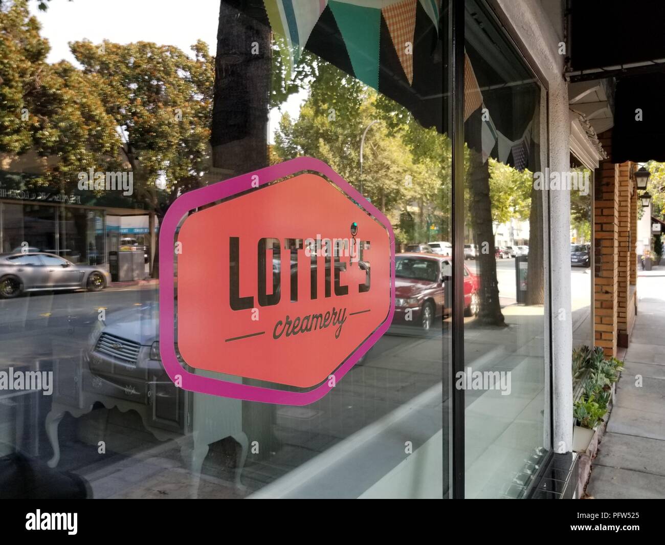 Sign on store window of Lottie's Creamery, an artisan small-batch creamery which pasteurizes its own milk for ice cream, Walnut Creek, California, August 6, 2018. () Stock Photo