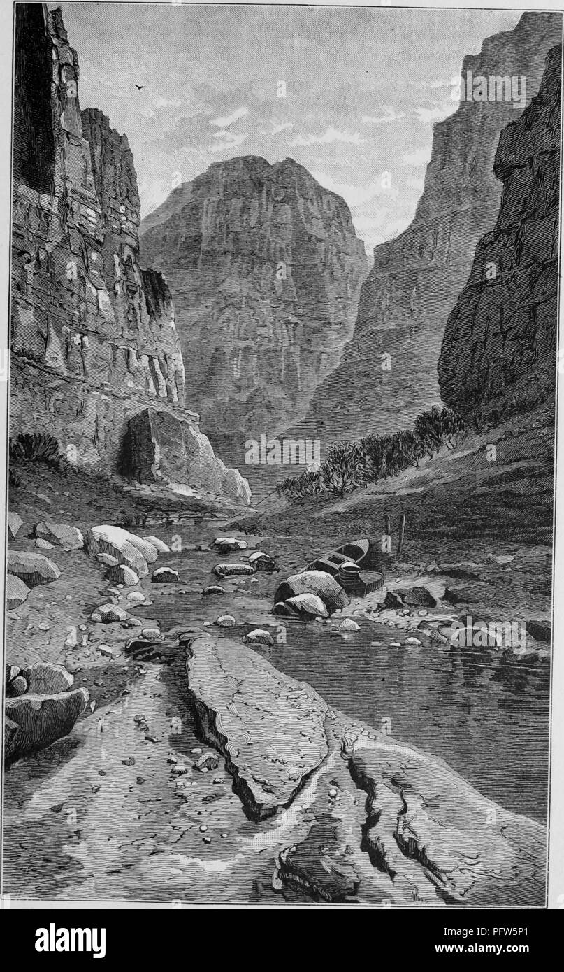 Black and white vintage print depicting the Kanab Creek winding through a gorge at Kanab Canyon, with a rowboat tied to a pole on a bank in the foreground, and buttes looming in the background, located in Utah, and published in William Makepeace Thayer's volume 'Marvels of the New West', 1887. Courtesy Internet Archive. () Stock Photo