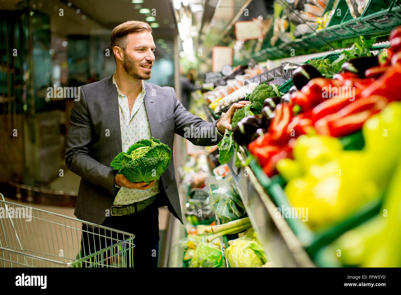Man buying vegetables hi-res stock photography and images - Alamy