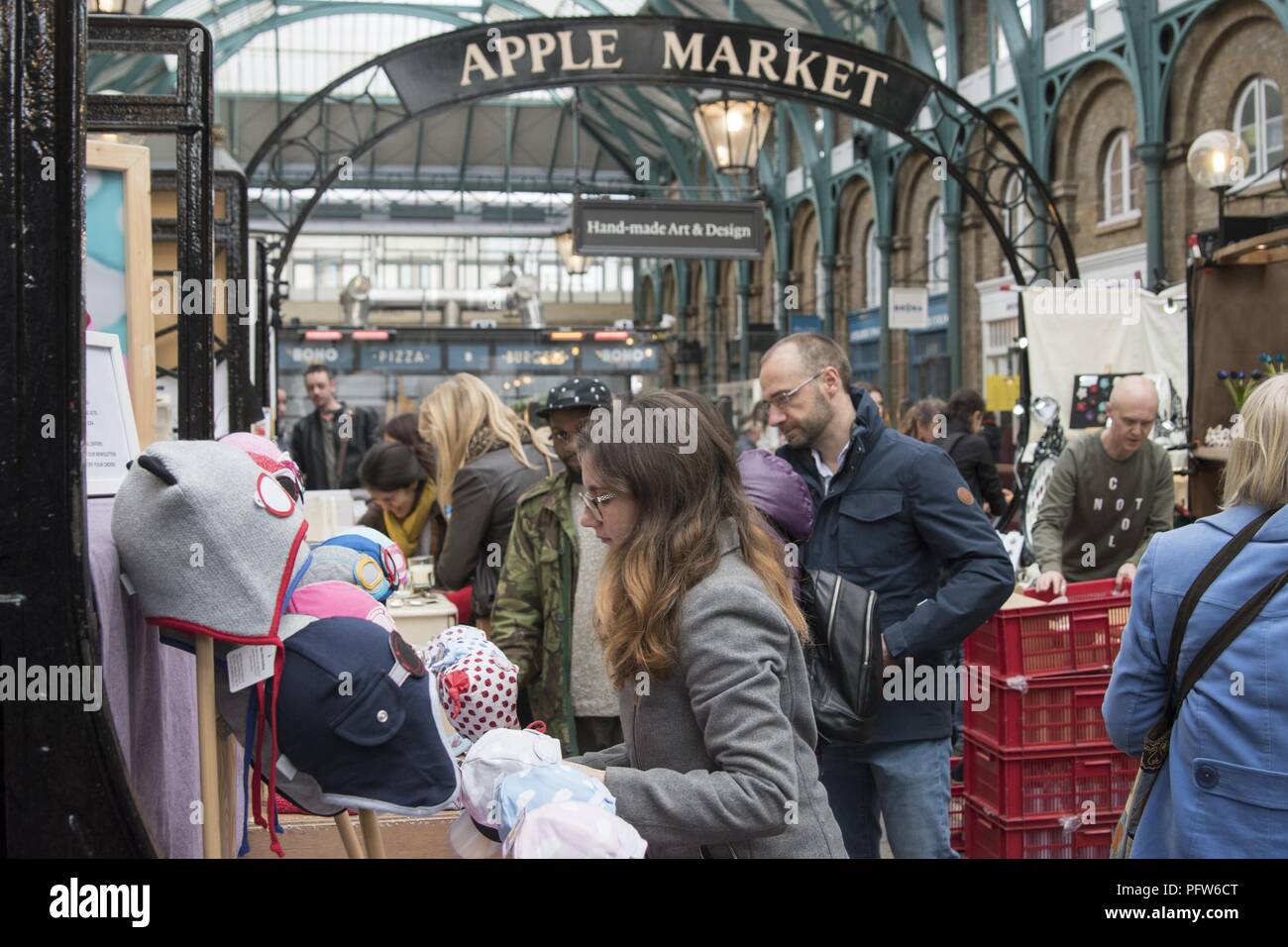 Crowded Apple Market in the New Covent Garden Market, Nine Elms, London, United Kingdom, October 29, 2017. () Stock Photo