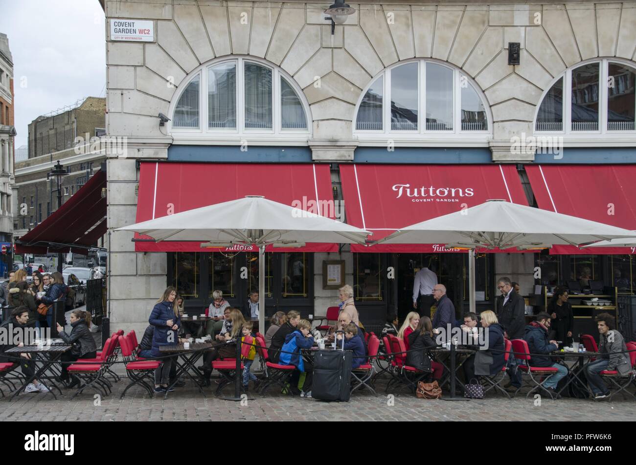 Crowded 'Tuttons' restaurant patio at Covent Garden, Westminster