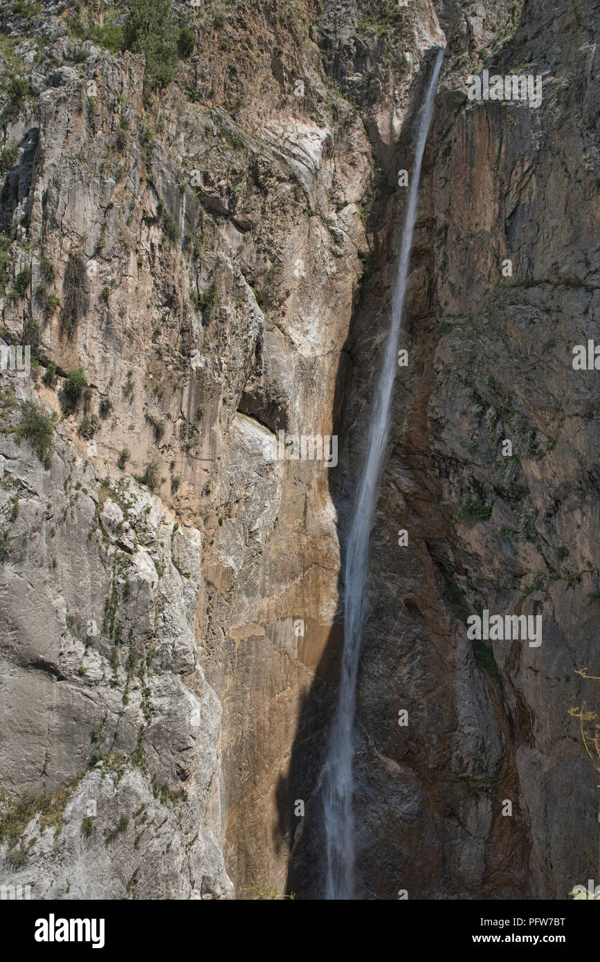 Big waterfall behind the walnut village of Arslanbob, Kyrgyzstan Stock Photo