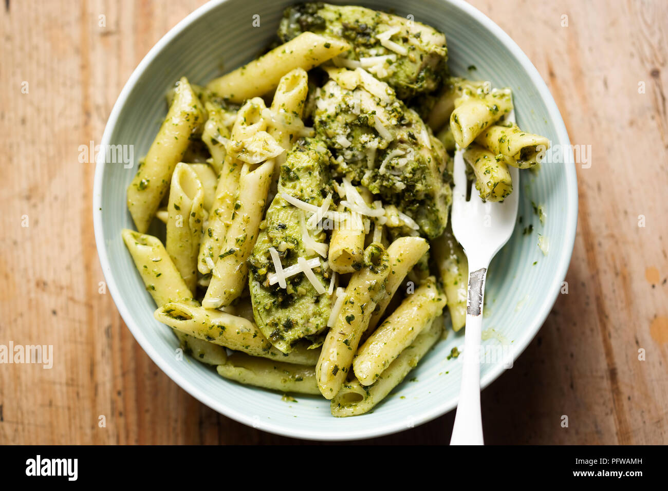 Green Pesto Chicken Pasta With Parmesan Stock Photo Alamy