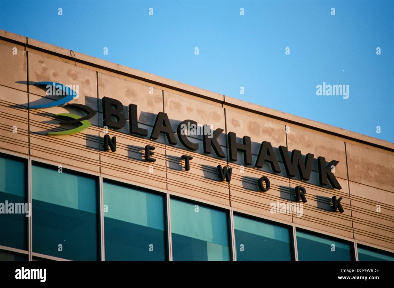 Close-up of sign with logo on facade at headquarters of payment processing and gift card company Blackhawk Network in Pleasanton, California, March 26, 2018. () Stock Photo