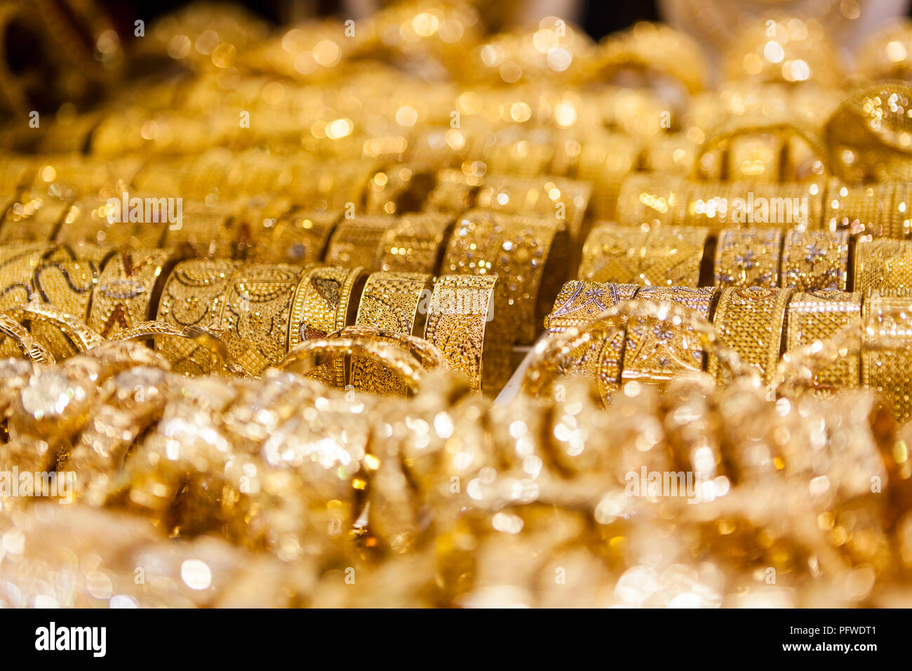 Display of glittering gold bracelets, which are popular Indian wedding 