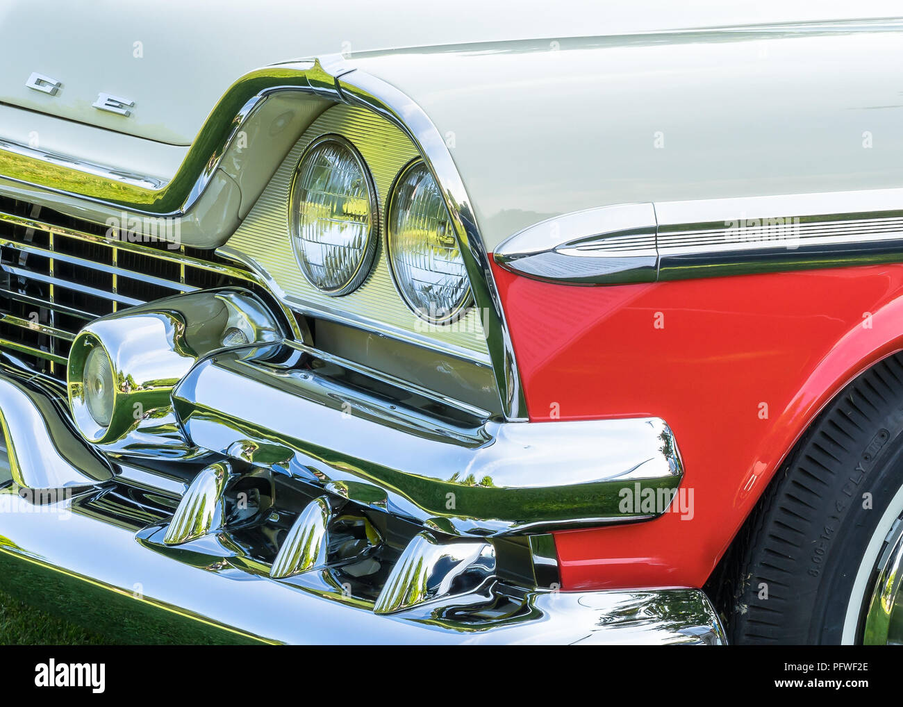 PLYMOUTH, MI/USA - JULY 29, 2018: A 1958 Dodge Custom Royal Lancer headlight on display at the Concours d'Elegance of America car show. Stock Photo