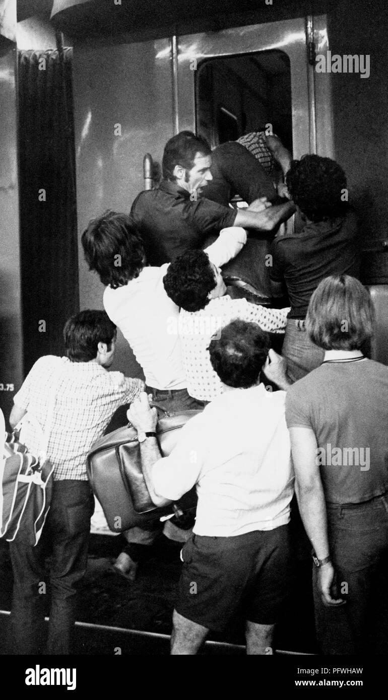 Italy, Milan, central station, assault on trains during the summer exodus, 70s Stock Photo