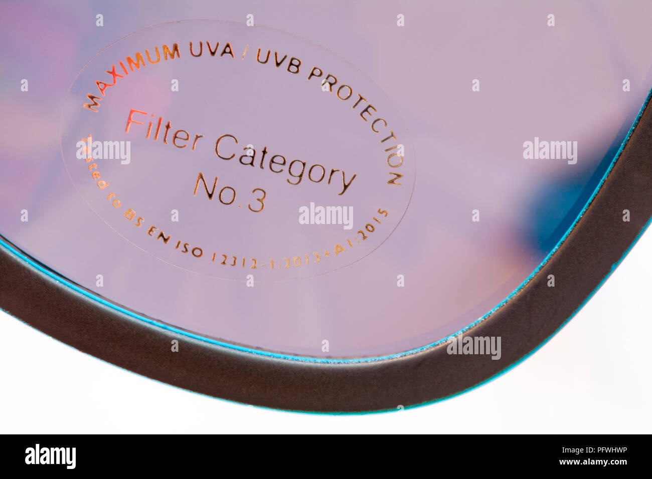 Maximum UVA UVB protection Filter Category No 3 sticker on blue edged  sunglasses Stock Photo - Alamy