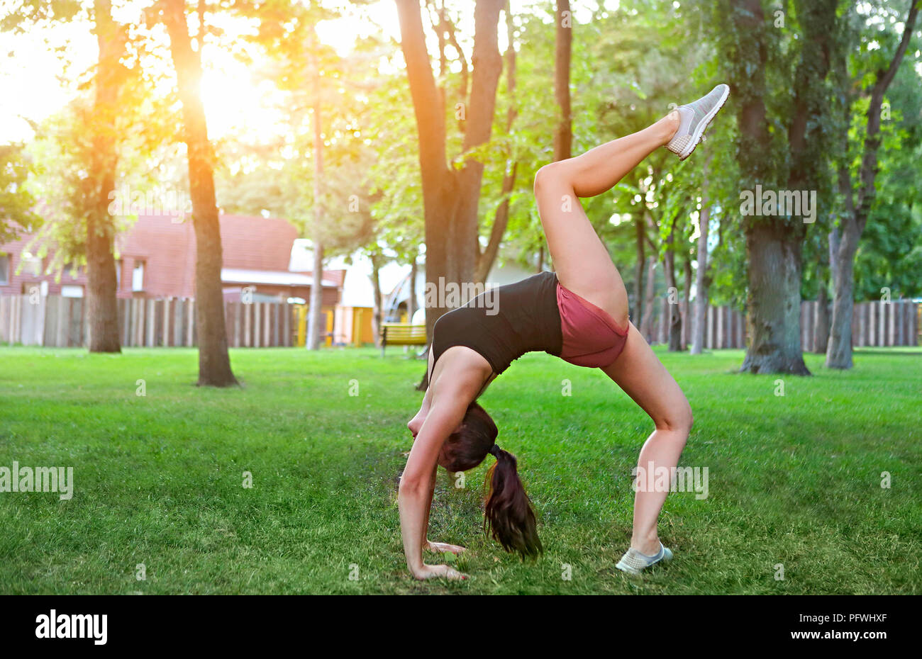 Stretching woman in outdoor exercise smiling happy doing stretches