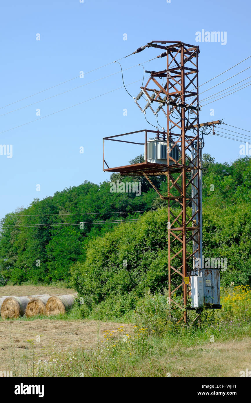 old rusty electricity pylon standing in rural countryside zala county hungary Stock Photo
