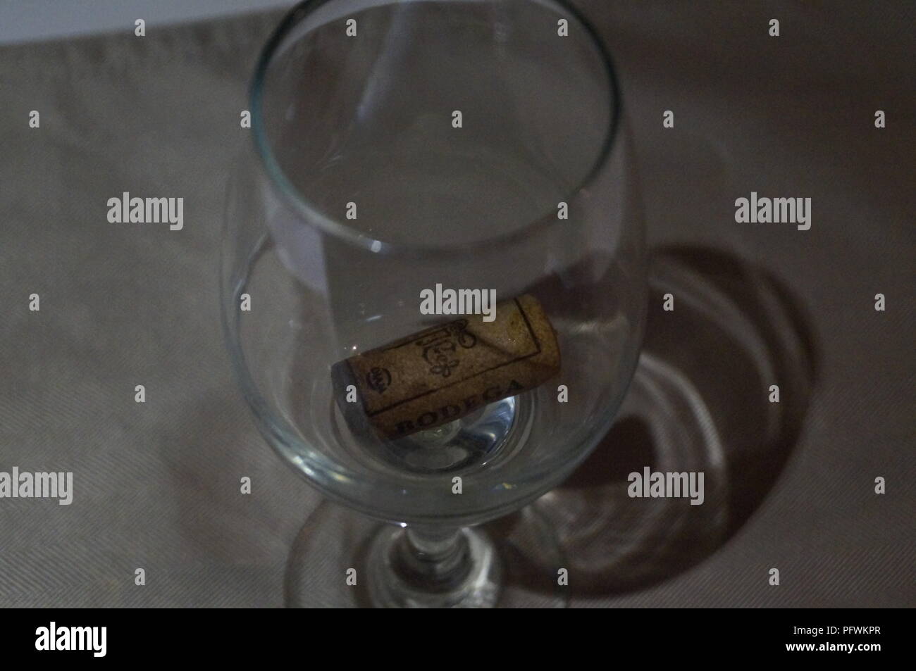Empty Wine glass with corck Stock Photo