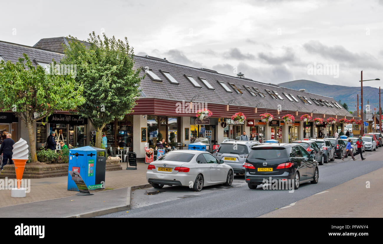 AVIEMORE HIGHLANDS SCOTLAND BUSY MAIN STREET WITH ROWS OF SHOPS Stock