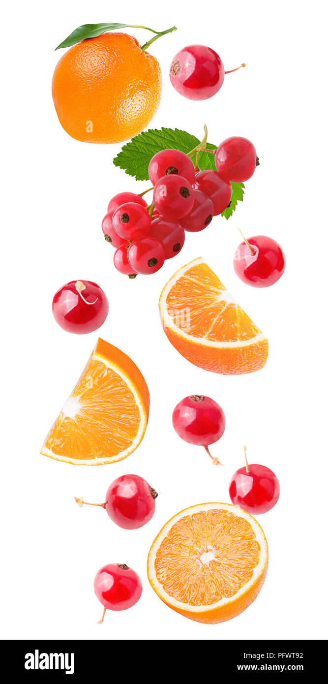 Flying orange and red currant isolated on white Stock Photo