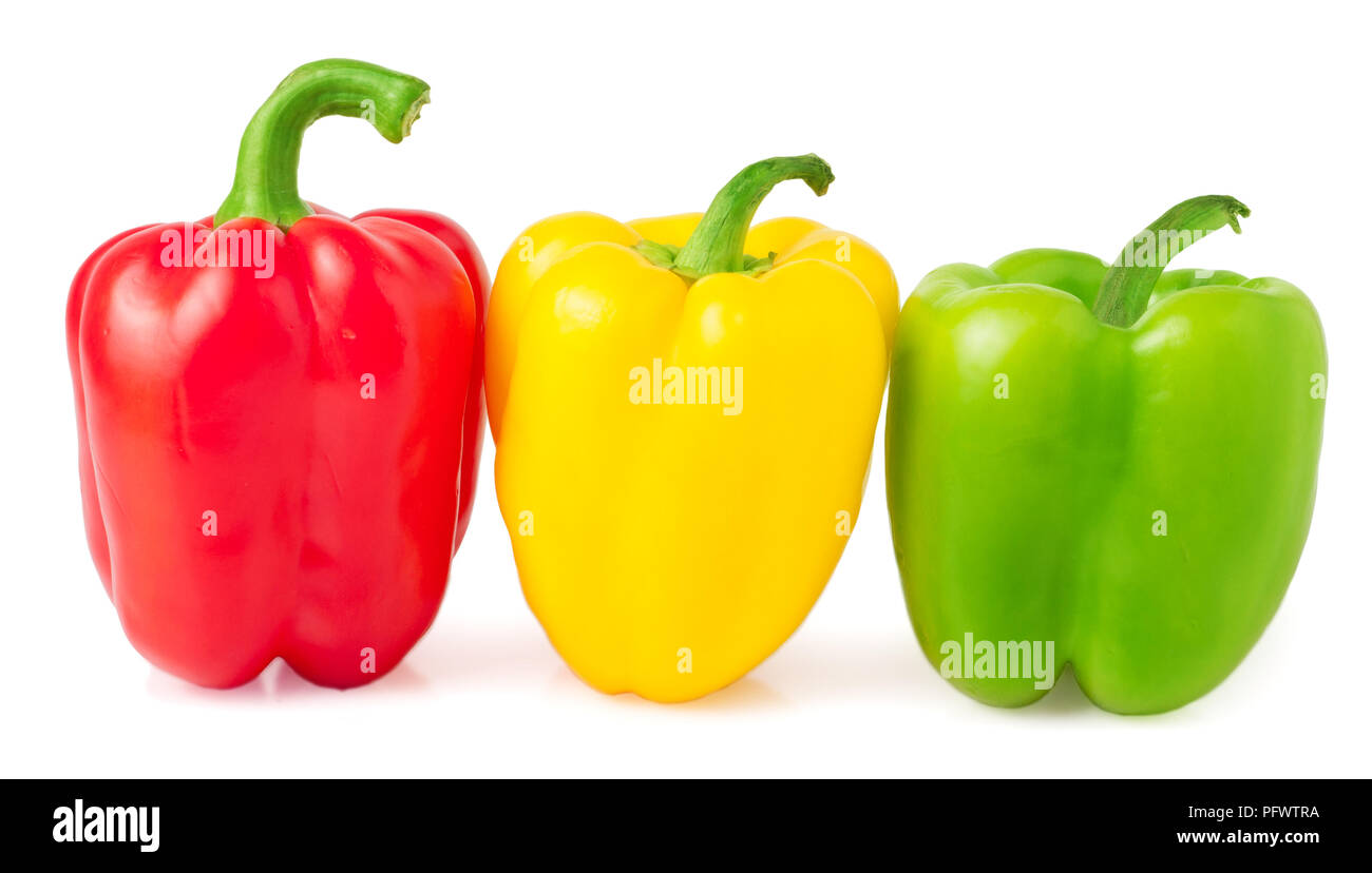 Red, yellow and green bell peppers on a white background Stock Photo ...