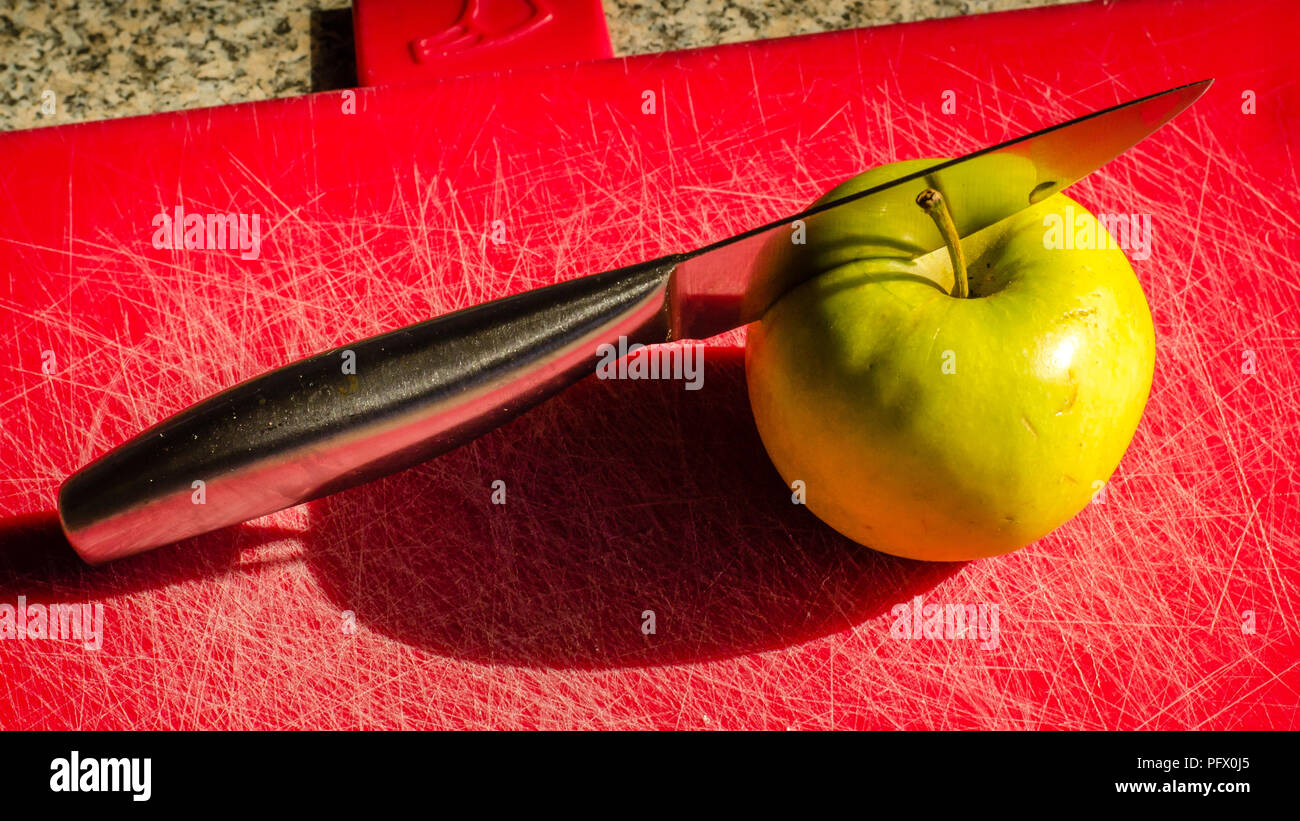 Cut apples pieces knife hi-res stock photography and images - Alamy