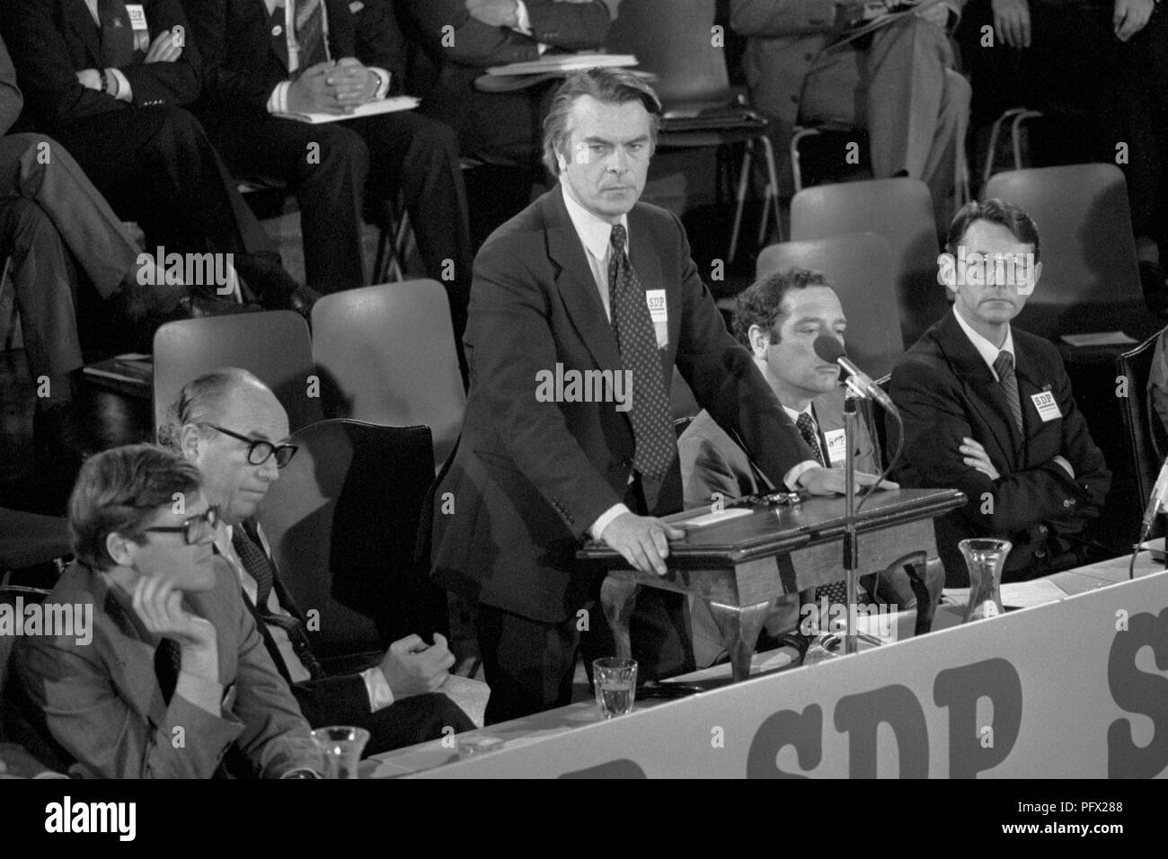 Dr David Owen pauses during a speech on constitutional reform on the rostrum at central Hall, Westminster, on the 5th day of the SDP conference. Second left on the platform is co-leader of the new Party, Roy Jenkins. Stock Photo