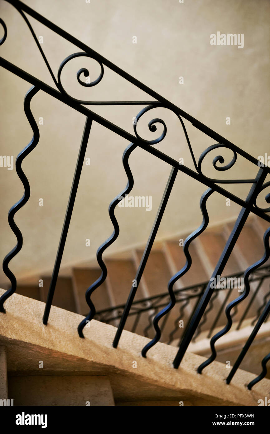 Home Interior And Wrought Iron Stair Railing Stock Photo