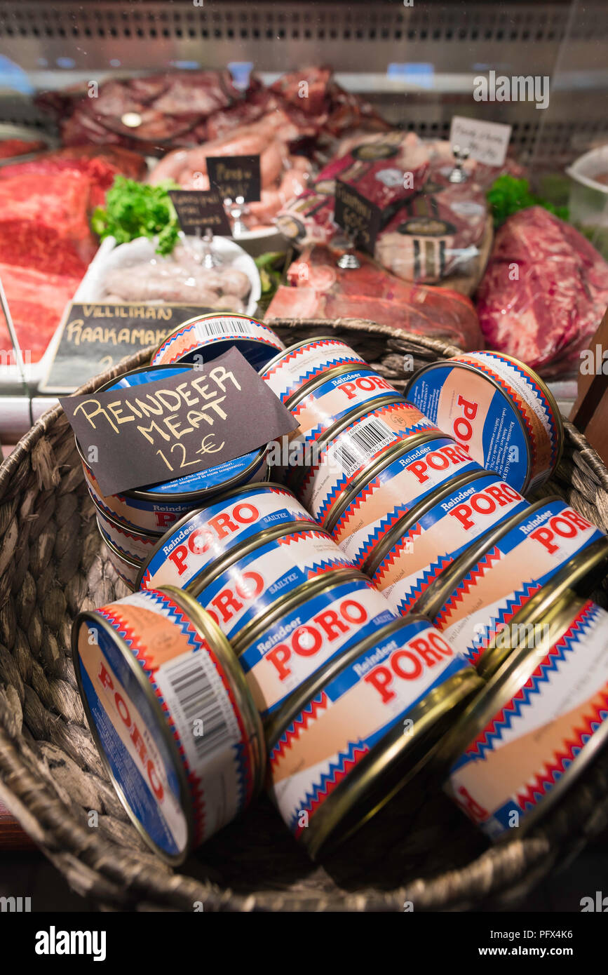 Helsinki food, tins of moose and reindeer meat for sale at a butcher's stall in the Kauppahalli market hall in the harbor area of Helsinki, Finland. Stock Photo