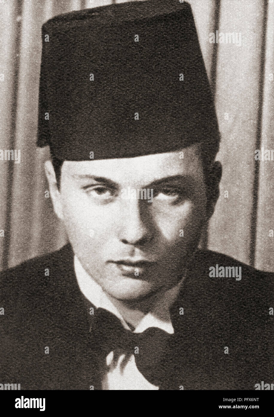 Farouk I ,1920 – 1965.  Tenth ruler of Egypt from the Muhammad Ali dynasty and the penultimate King of Egypt and the Sudan, seen here in 1936 aged 16 when he succeeded to the throne on the death of his father. From These Tremendous Years, published 1938. Stock Photo
