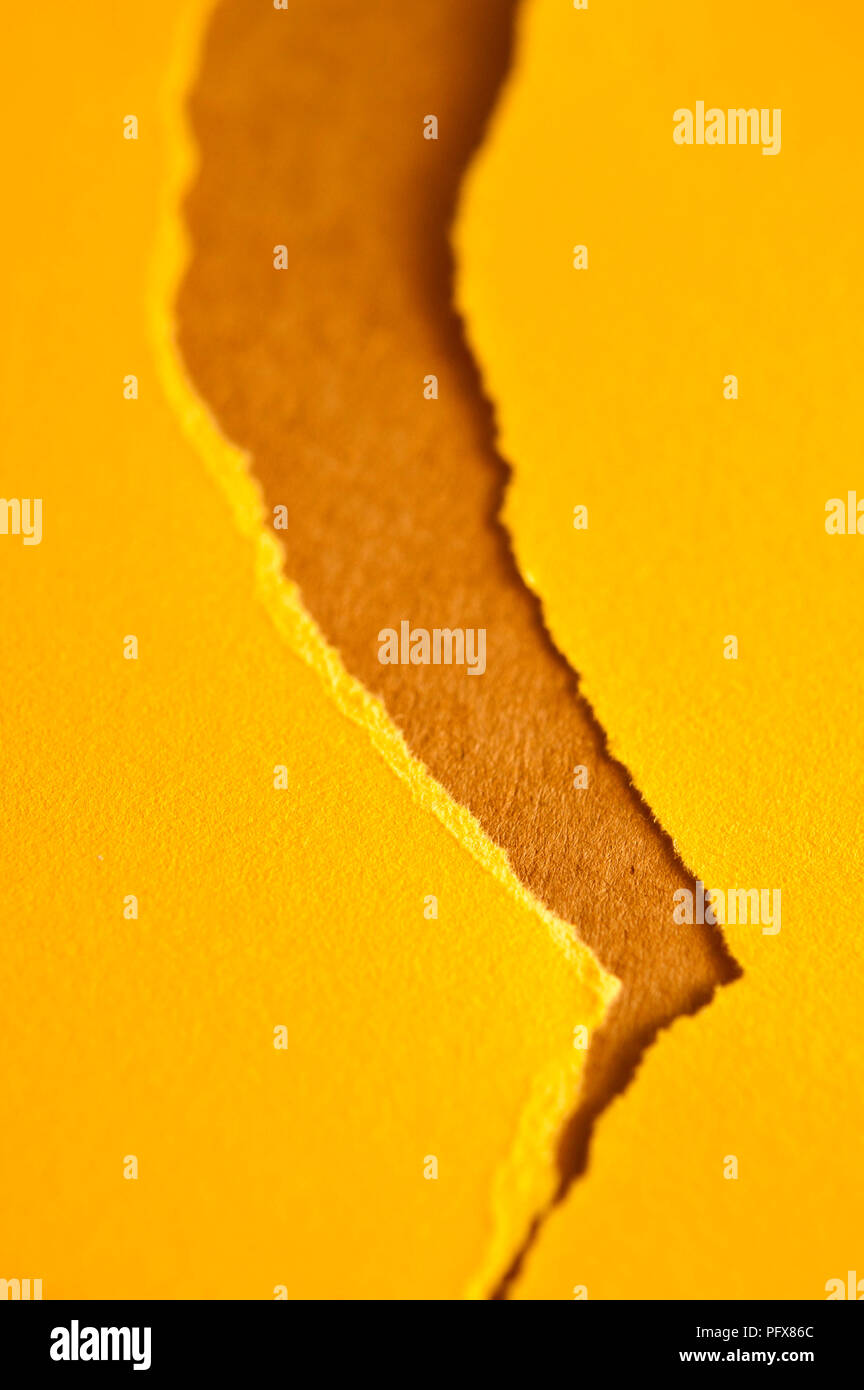 Ripped paper yellow hi-res stock photography and images - Alamy