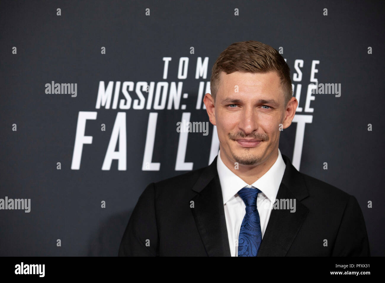 Actor Frederick Schmidt walks the red caret prior to a screening of Mission Impossible Fallout a the Smithsonian National Air and Space Museum on July 22, in Washington, DC. Stock Photo