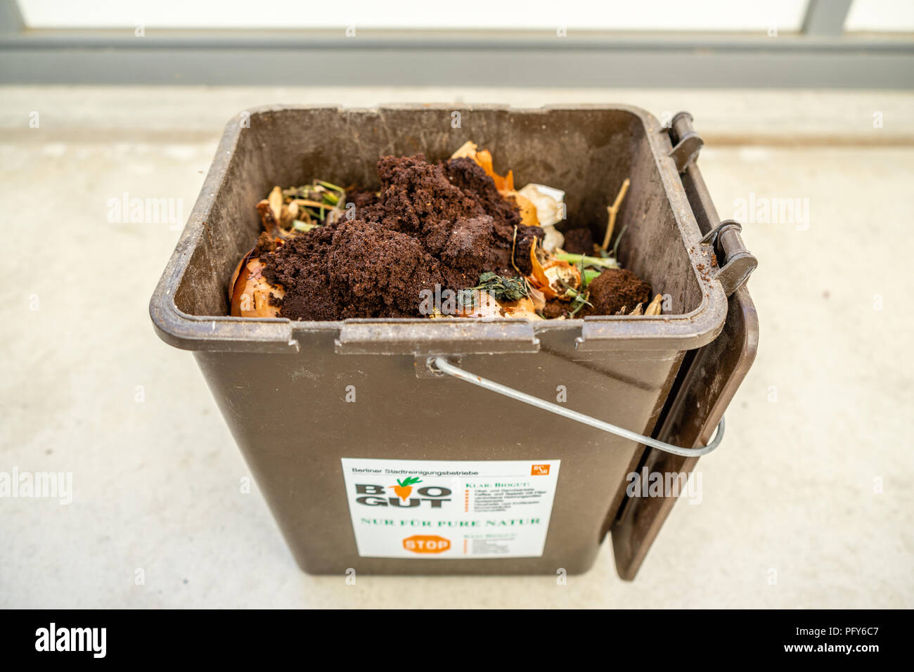 Small brown bin with biodegradable waste (Biomuell), organic waste bin Stock Photo