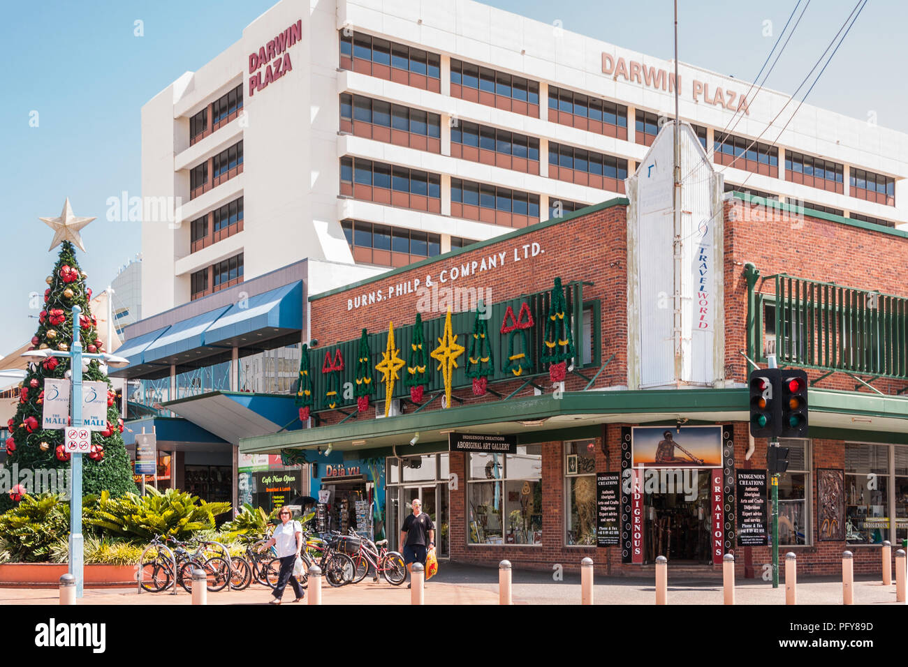 Darwin, Northen Territory, Australia - December 1, 2009: Main street is shopping street downtown and shows Christmas decorations with shops, hotel, pe Stock Photo
