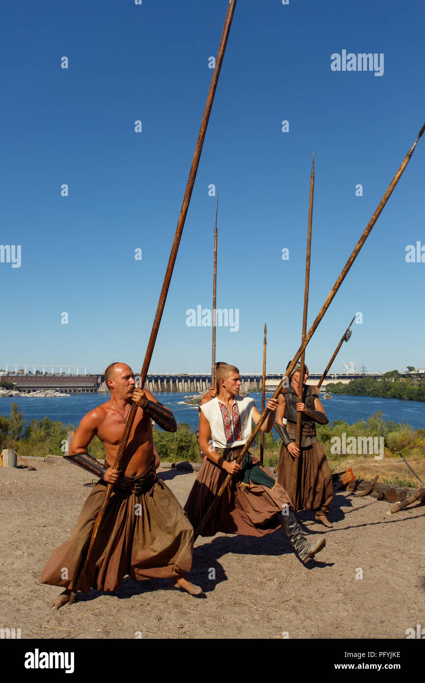 Cossacks with spears simulate offensive. Zaporozhye island Khortytsya ...