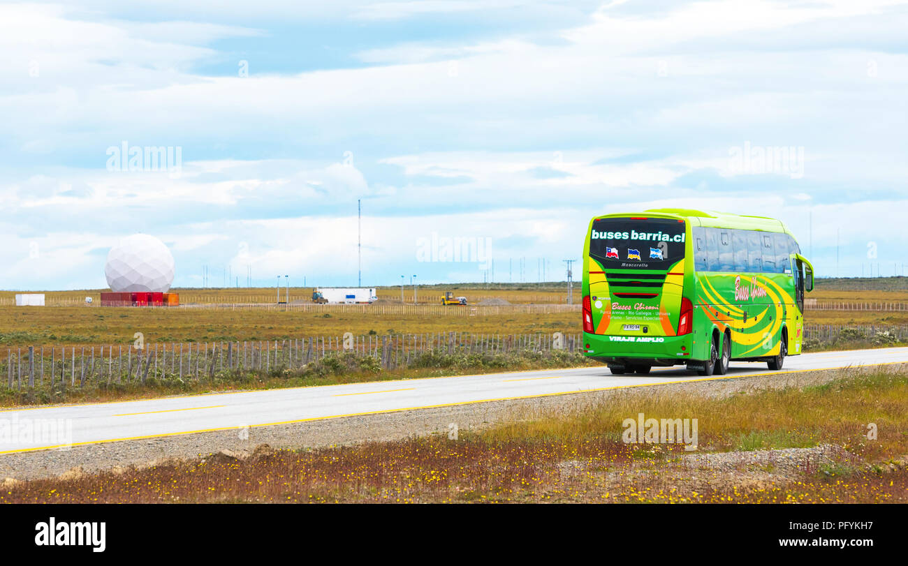 PATAGONIA, CHILE - JANUARY 4, 2018: Tourist bus on the road. Copy space for text Stock Photo