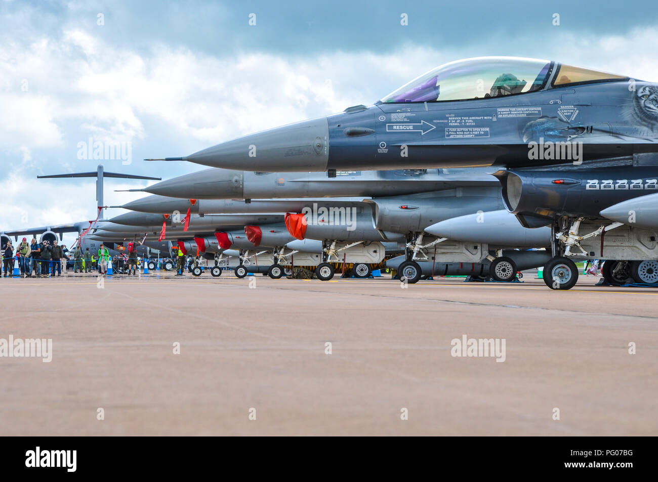Line up of General Dynamics Lockheed Martin F-16 Fighting Falcon fighter jets at the Royal International Air Tattoo RIAT RAF Fairford, UK Stock Photo