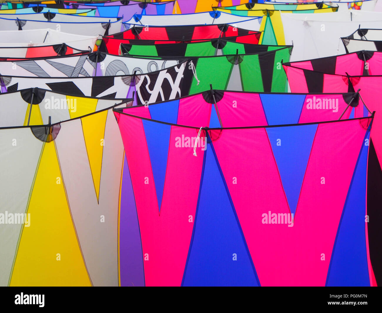 Decorated fabric of box kites sitting on the ground Stock Photo - Alamy