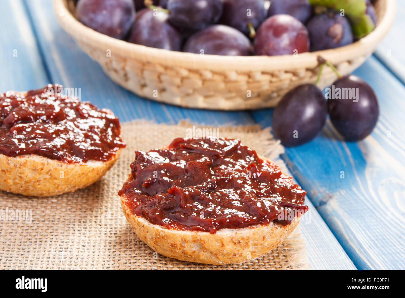 Sandwiches with plum marmalade or jam, concept of healthy sweet snack or dessert Stock Photo