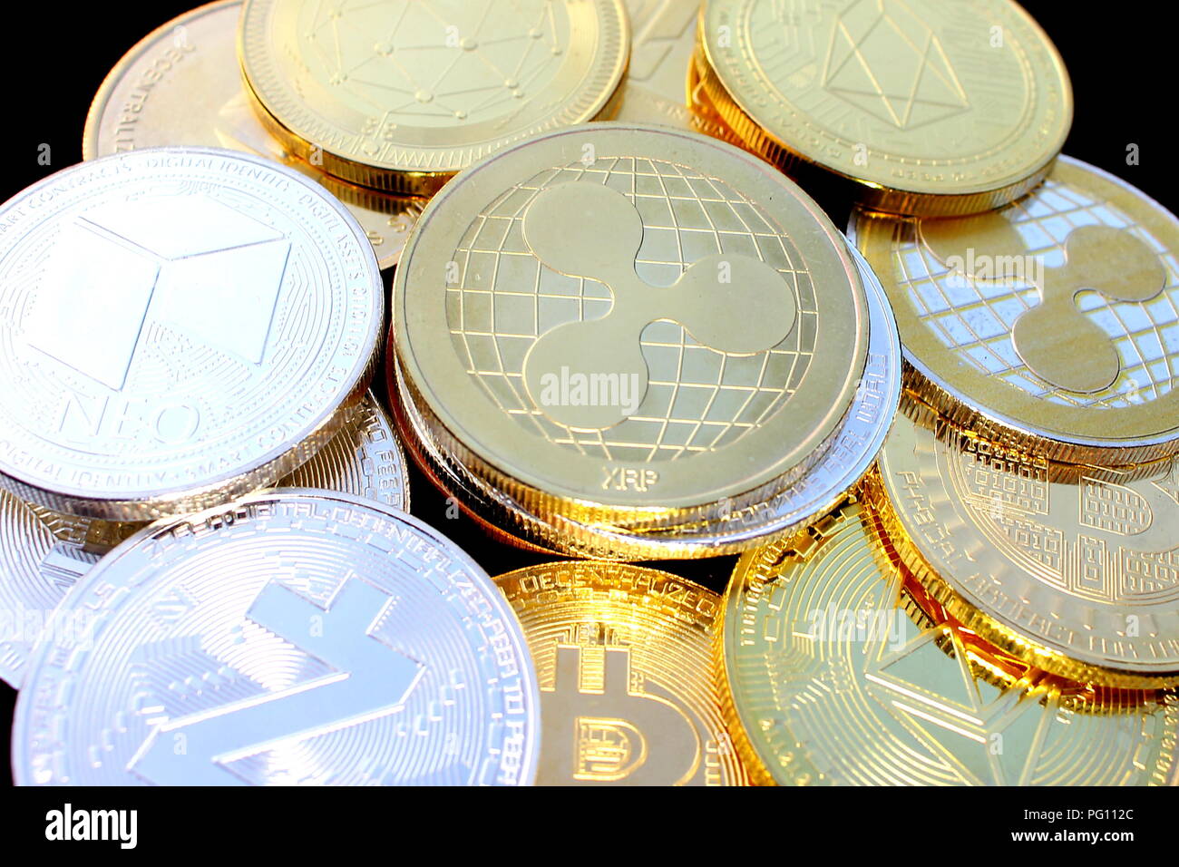 Ripple - a new cryptocurrency revolutionizing digital payment - coin with  other crypto coins Stock Photo - Alamy