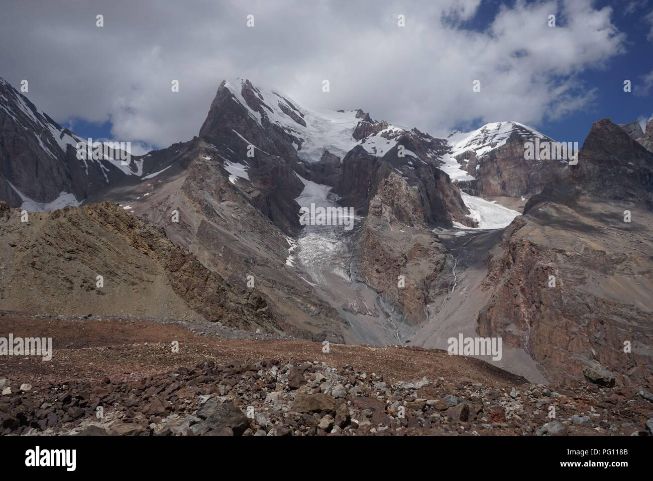 Snowy peaks as seen from the mountain Pass, Fann Mountains, Tajikistan Stock Photo