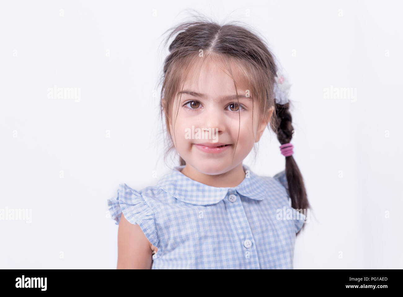 Portrait of cute girl in school uniform is ready to go school.Copy
