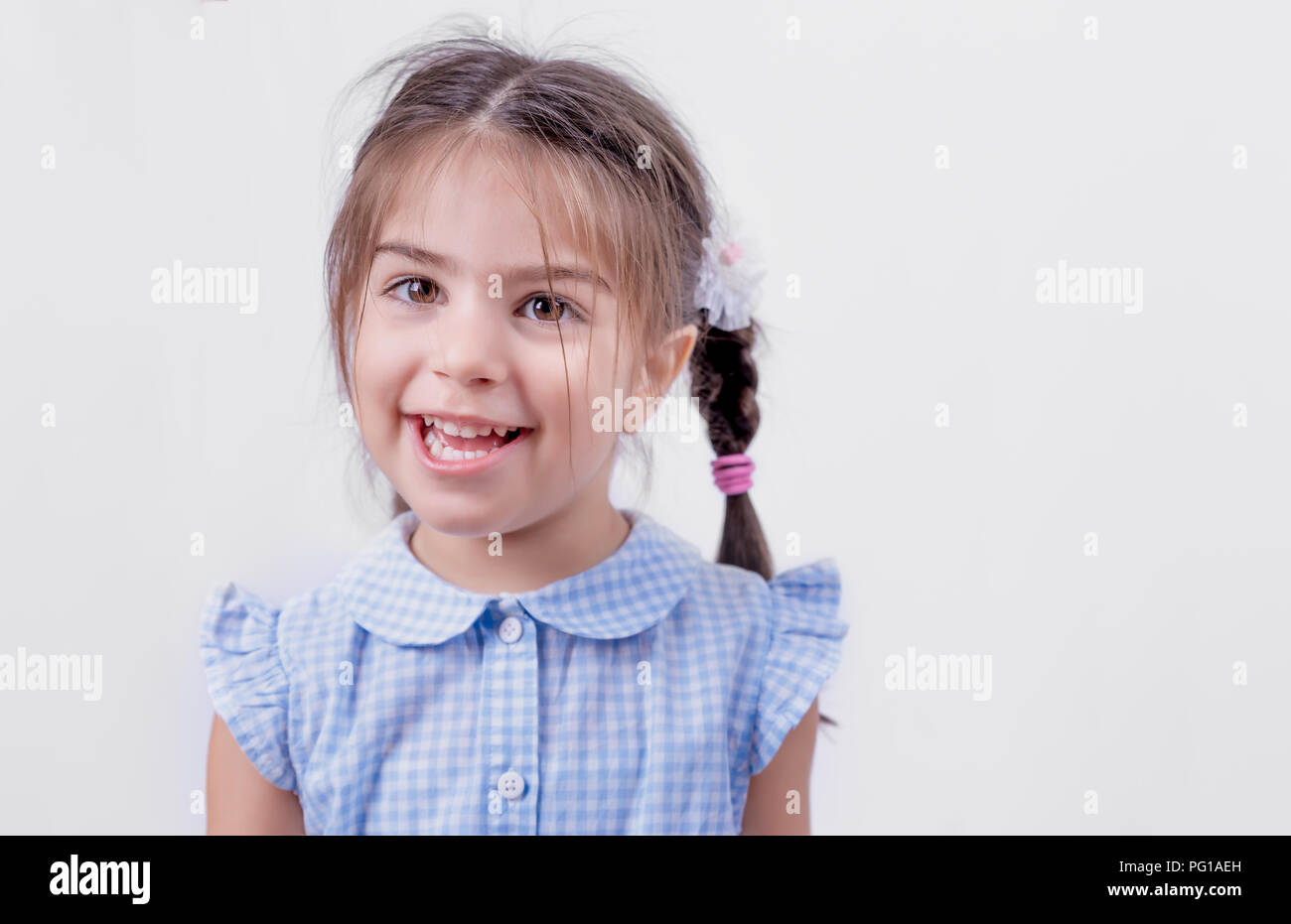 Portrait of cute girl in school uniform is ready to go school.Copy